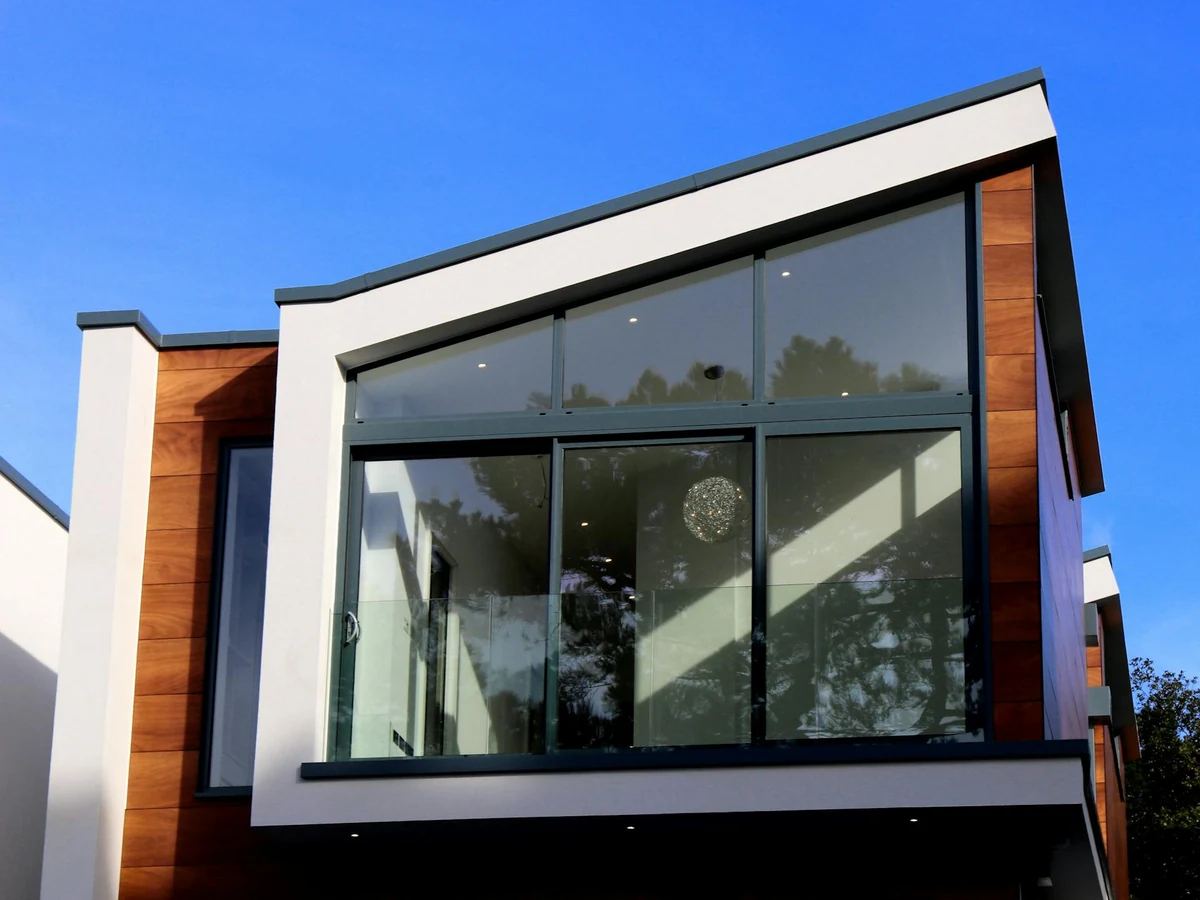 Modern house facade exterior painting in Worthing by Worthing Painters